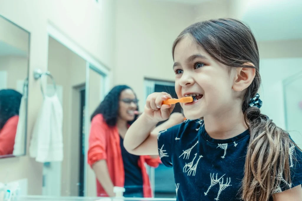 Baby Toothbrushes & Toothpaste: An Age-by-Age Guide