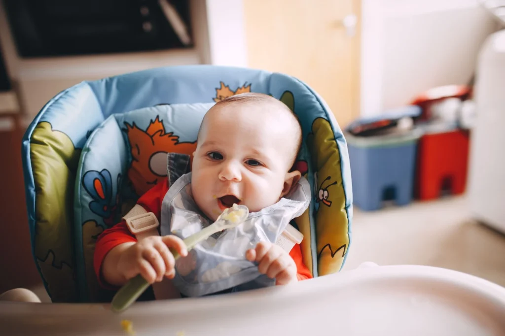 Introducing Solids: Your Guide to First Baby Foods & Spoon-Feeding